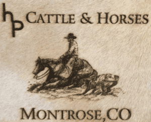 A close up of the logo for cattle and horses.